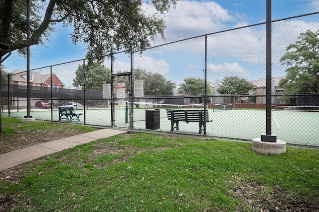 4242 N Capistrano Dr Unit 203, Dallas, TX 75287 - view of sport court with fence and a gate