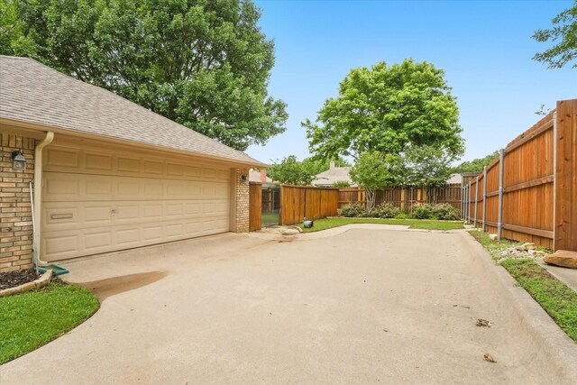 garage with fence