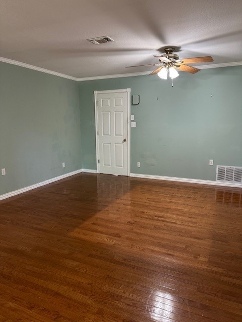 7249 Peden Rd, Azle, TX 76020 - unfurnished room featuring crown molding, visible vents, wood finished floors, and a ceiling fan