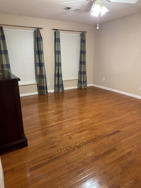 7249 Peden Rd, Azle, TX 76020 - spare room with a ceiling fan, baseboards, visible vents, and wood finished floors