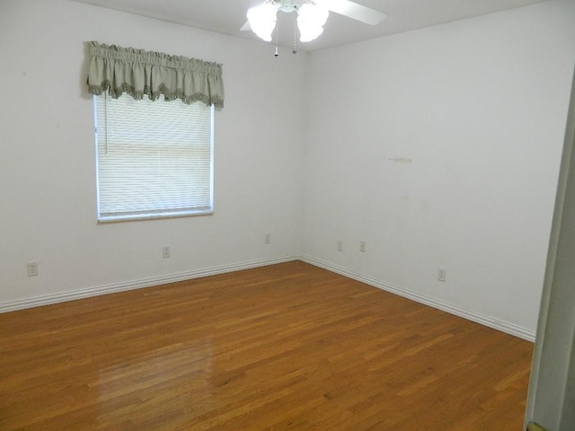 7249 Peden Rd, Azle, TX 76020 - empty room featuring baseboards, ceiling fan, and wood finished floors