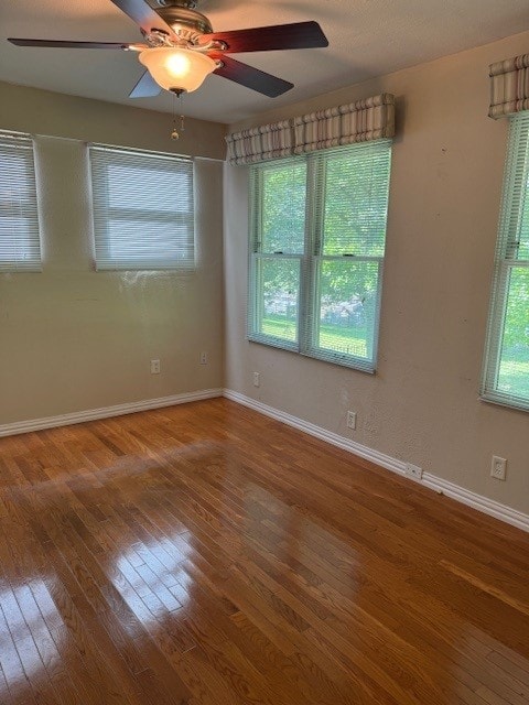 7249 Peden Rd, Azle, TX 76020 - spare room featuring ceiling fan, hardwood / wood-style flooring, and baseboards