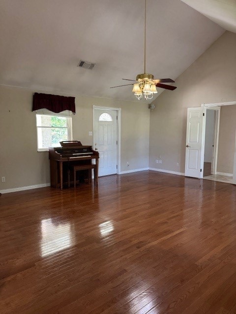 7249 Peden Rd, Azle, TX 76020 - unfurnished living room with lofted ceiling, wood finished floors, visible vents, a ceiling fan, and baseboards