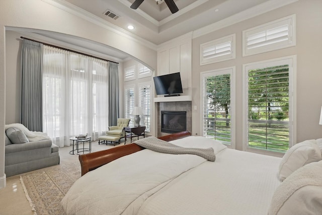 120 Quiet Hill Cir, Copper Canyon, TX 76226 - bedroom with crown molding, a glass covered fireplace, recessed lighting, and ceiling fan
