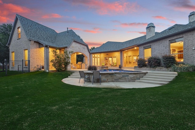 120 Quiet Hill Cir, Copper Canyon, TX 76226 - rear view of house featuring brick siding, a chimney, and a patio area