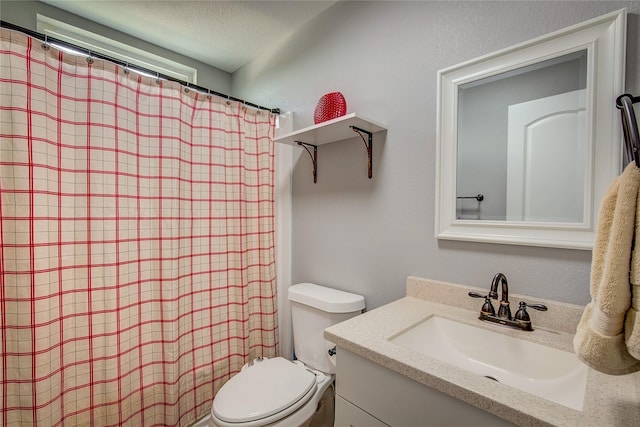 185 Seminole Trl, East Tawakoni, TX 75472 - bathroom with toilet, a shower with shower curtain, and vanity