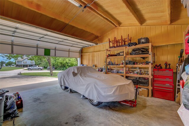 185 Seminole Trl, East Tawakoni, TX 75472 - garage featuring wooden ceiling and wooden walls