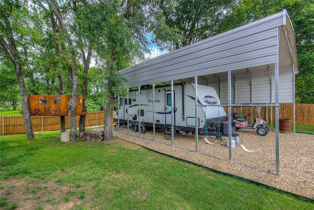 185 Seminole Trl, East Tawakoni, TX 75472 - view of parking featuring fence and a carport