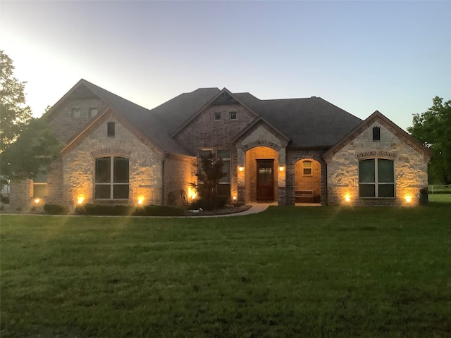 360 Rs County Road 3419, Emory, TX 75440 - french country inspired facade featuring stone siding, a front lawn, and brick siding