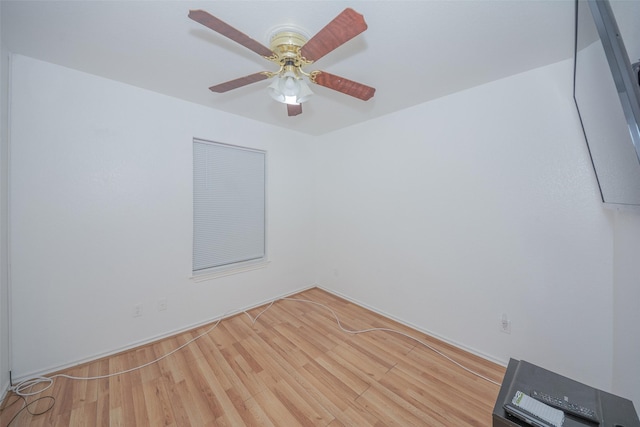 1022 Wootton Ave, Bridgeport, TX 76426 - empty room with ceiling fan and wood finished floors