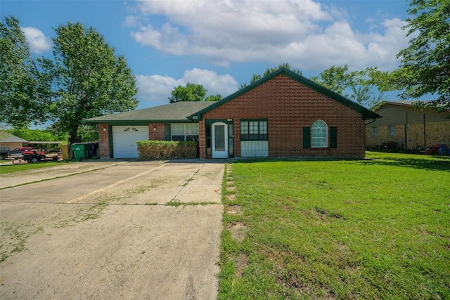1022 Wootton Ave, Bridgeport, TX 76426 - single story home with a front lawn, brick siding, driveway, and a garage