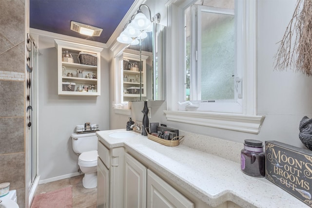801 Dalton Dr, Princeton, TX 75407 - bathroom with a stall shower, vanity, toilet, and baseboards