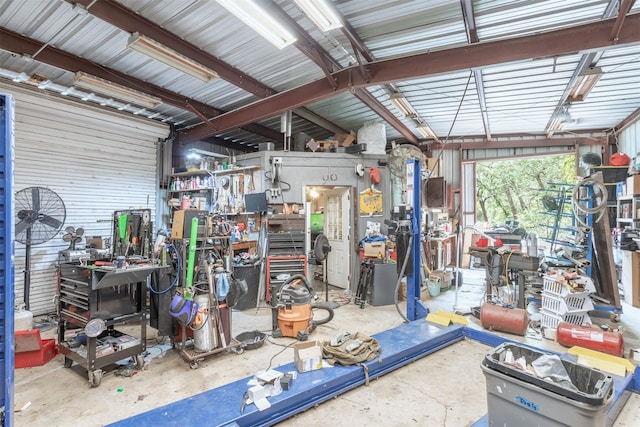 801 Dalton Dr, Princeton, TX 75407 - garage featuring a workshop area