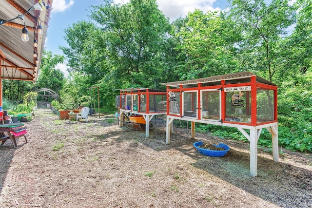 801 Dalton Dr, Princeton, TX 75407 - view of yard featuring an outbuilding and exterior structure