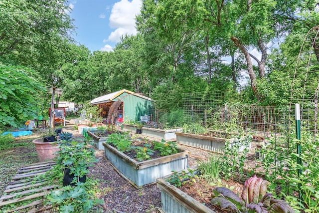 801 Dalton Dr, Princeton, TX 75407 - view of yard with a storage shed, a vegetable garden, and an outdoor structure