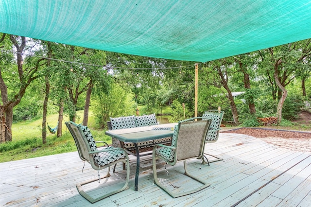 801 Dalton Dr, Princeton, TX 75407 - wooden terrace featuring outdoor dining area