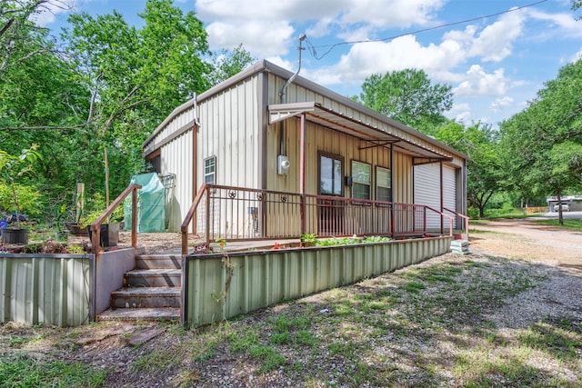801 Dalton Dr, Princeton, TX 75407 - view of front of home with a porch and board and batten siding