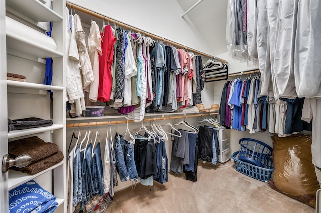spacious closet with carpet flooring