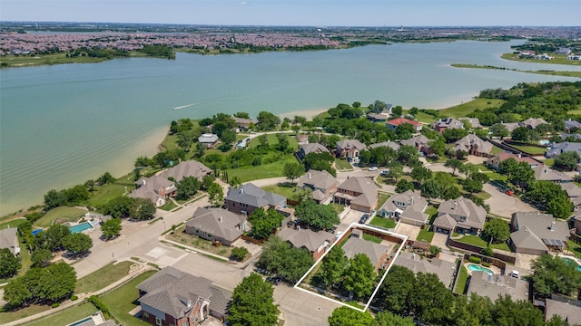 aerial view featuring a water view and a residential view