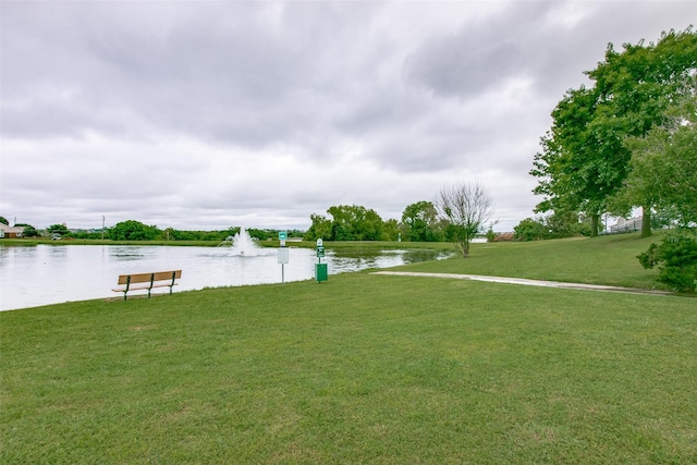 view of yard with a water view