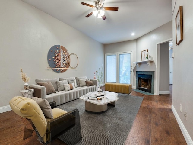 5550 Spring Valley Rd Unit F12, Dallas, TX 75254 - living area featuring wood finished floors, a ceiling fan, a fireplace, and baseboards
