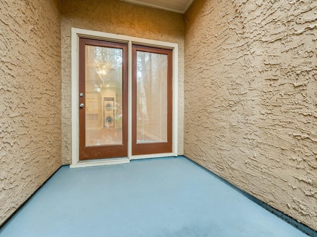 5550 Spring Valley Rd Unit F12, Dallas, TX 75254 - entrance to property featuring stucco siding