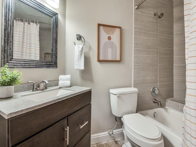 5550 Spring Valley Rd Unit F12, Dallas, TX 75254 - bathroom featuring baseboards, toilet, vanity, and shower / bath combo with shower curtain