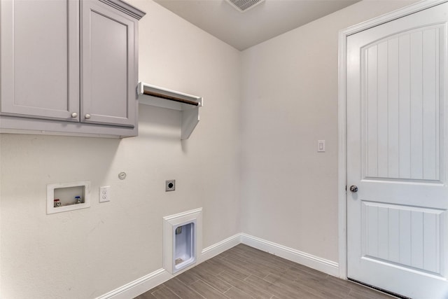 1451 Silver Sage Dr, Haslet, TX 76052 - laundry room featuring baseboards, electric dryer hookup, washer hookup, hookup for a gas dryer, and wood finished floors