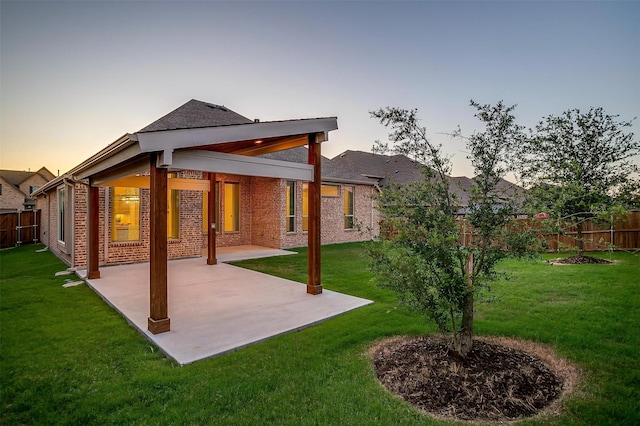 1451 Silver Sage Dr, Haslet, TX 76052 - back of property with a patio area and brick siding