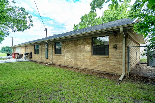 2100 Albert Broadfoot, Bonham, TX 75418 - rear view of property featuring a patio area and roof with shingles