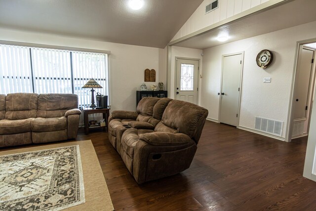 2100 Albert Broadfoot, Bonham, TX 75418 - living room with vaulted ceiling, dark wood-style floors, and baseboards