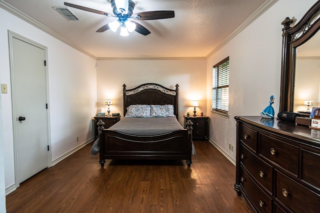 2100 Albert Broadfoot, Bonham, TX 75418 - bedroom with dark wood-style flooring, crown molding, baseboards, and a ceiling fan
