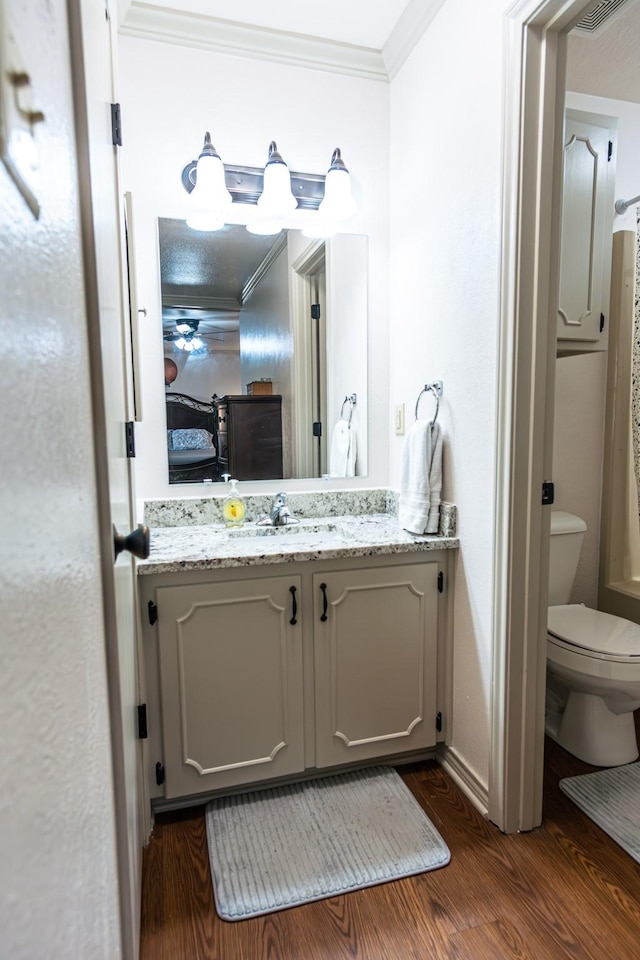 2100 Albert Broadfoot, Bonham, TX 75418 - full bath featuring crown molding, wood finished floors, toilet, and vanity