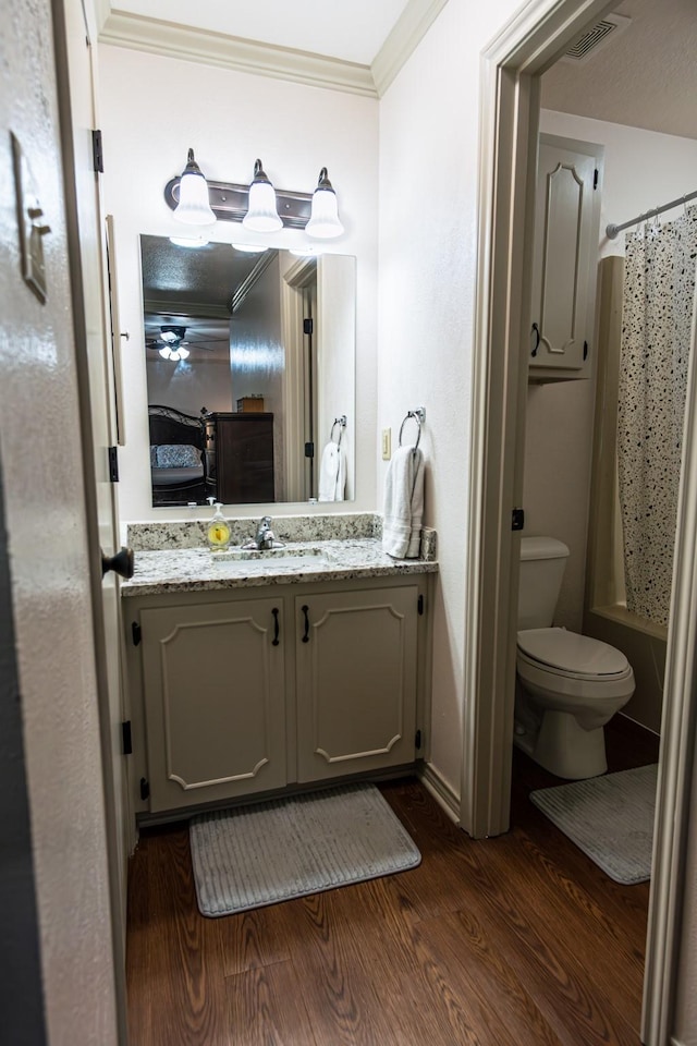 2100 Albert Broadfoot, Bonham, TX 75418 - full bath with wood finished floors, crown molding, toilet, and vanity