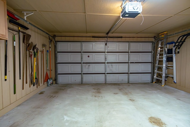 2100 Albert Broadfoot, Bonham, TX 75418 - garage featuring a garage door opener