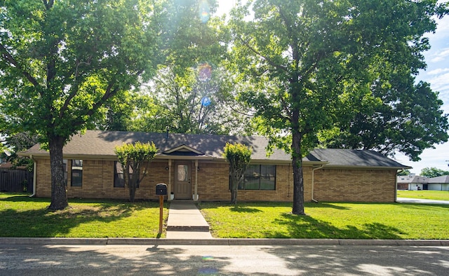 2100 Albert Broadfoot, Bonham, TX 75418 - ranch-style home featuring a front yard and brick siding