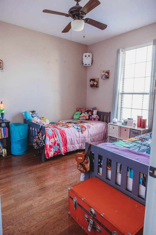 710 Mockingbird St, Bonham, TX 75418 - bedroom featuring a ceiling fan and wood finished floors