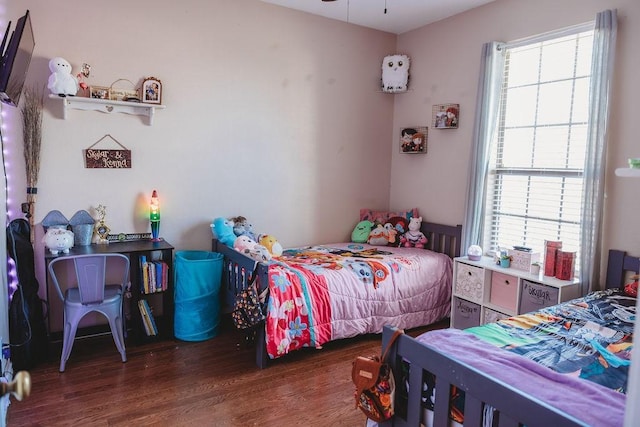 710 Mockingbird St, Bonham, TX 75418 - bedroom with wood finished floors