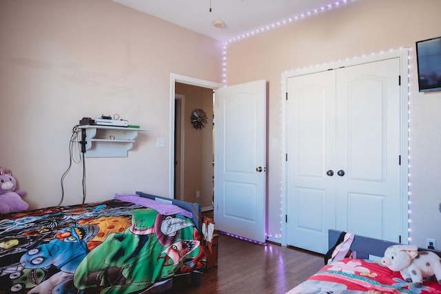 710 Mockingbird St, Bonham, TX 75418 - bedroom with a closet and dark wood-style floors