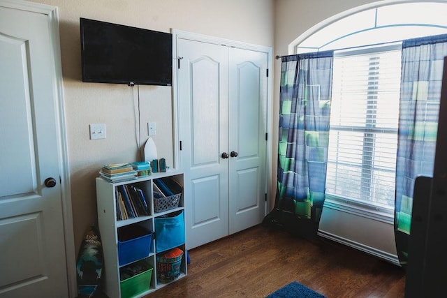 710 Mockingbird St, Bonham, TX 75418 - doorway to outside with dark wood-style flooring