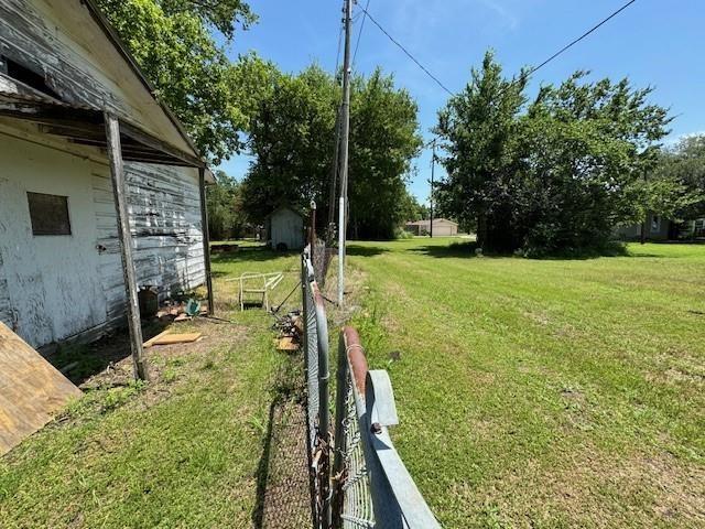 409 E College St, Leonard, TX 75452 - view of yard with fence