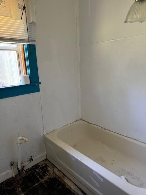 409 E College St, Leonard, TX 75452 - full bathroom with a washtub