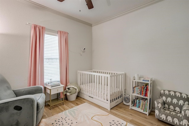 3711 Winding Way, Granbury, TX 76049 - bedroom featuring multiple windows, ornamental molding, ceiling fan, and wood finished floors