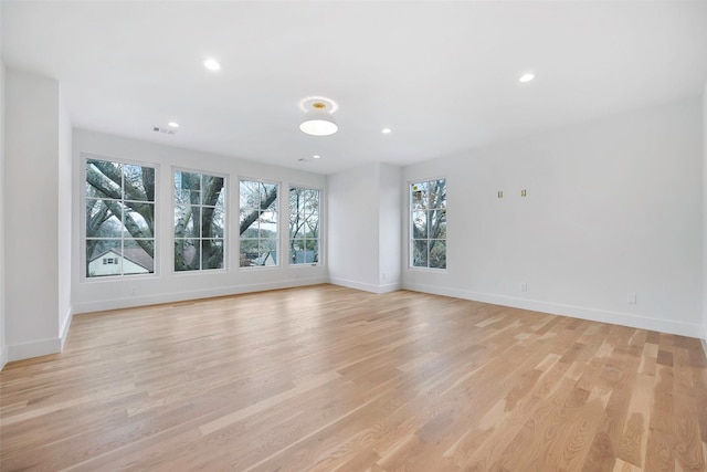 2212 Ridge Crest Dr, Richardson, TX 75080 - unfurnished living room featuring light wood-type flooring, baseboards, and recessed lighting
