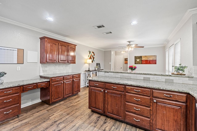 10121 Fireside Ln, Forney, TX 75126 - kitchen with ceiling fan, ornamental molding, visible vents, and dark wood-type flooring