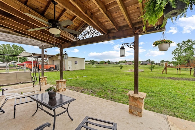 10121 Fireside Ln, Forney, TX 75126 - view of yard with an outdoor fire pit, fence, a deck, and a patio area