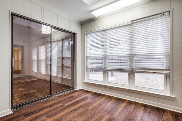 2 Preston Trail Ct, Pantego, TX 76013 - spare room with baseboards, dark wood-style floors, and a healthy amount of sunlight