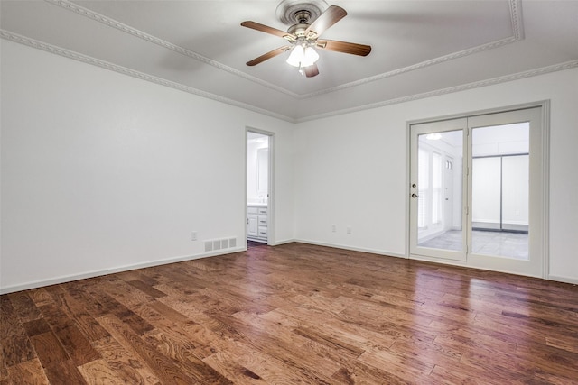 2 Preston Trail Ct, Pantego, TX 76013 - spare room featuring a ceiling fan, a tray ceiling, visible vents, and wood finished floors
