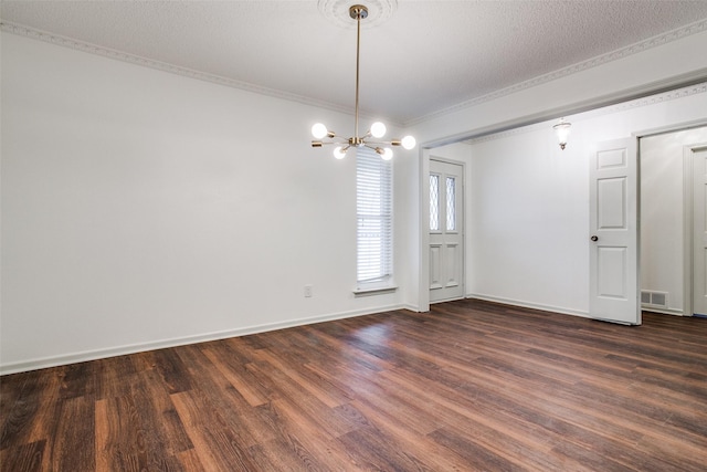 2 Preston Trail Ct, Pantego, TX 76013 - unfurnished room with a notable chandelier, baseboards, dark wood finished floors, visible vents, and crown molding