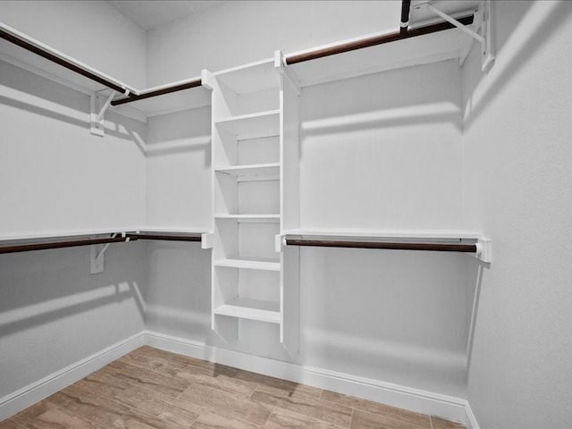 121 County Road 3471, Paradise, TX 76073 - spacious closet with wood finished floors